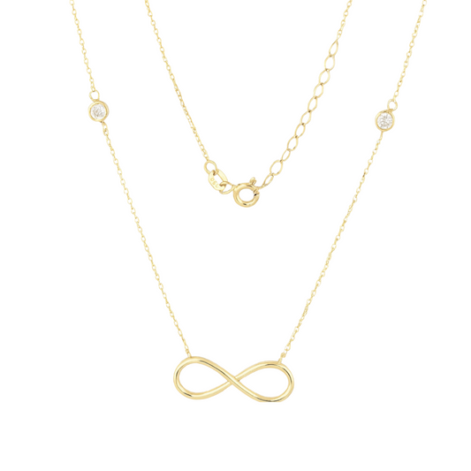 14k solid yellow gold infinity necklace with bezel set zircon on a white background by Qutahia Jewelry