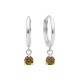 Qutahia Jewelry 14k solid gold dangling huggie earrings with claw-set yellow-green gemstones.