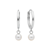 Qutahia Jewelry 14k solid gold huggie earrings with dangling pearl, claw-set solitaire.